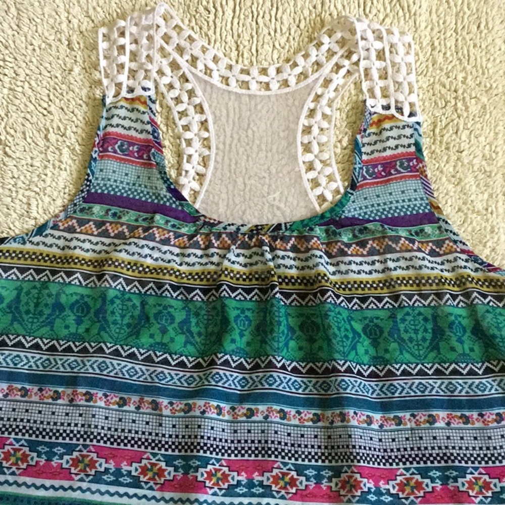 Multi-colored, light  & cropped racer back blouse.